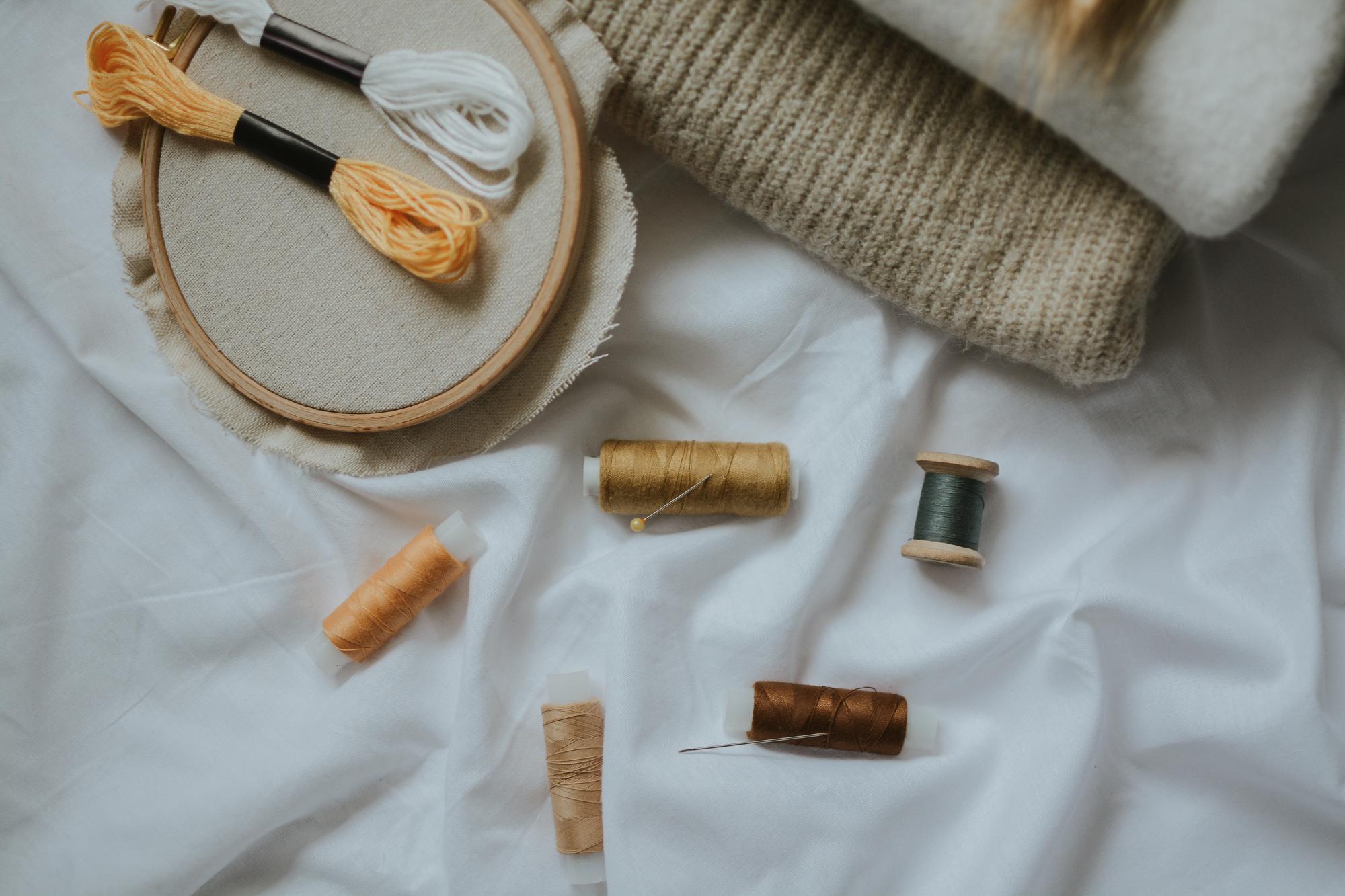 embroidered samples and threads on table