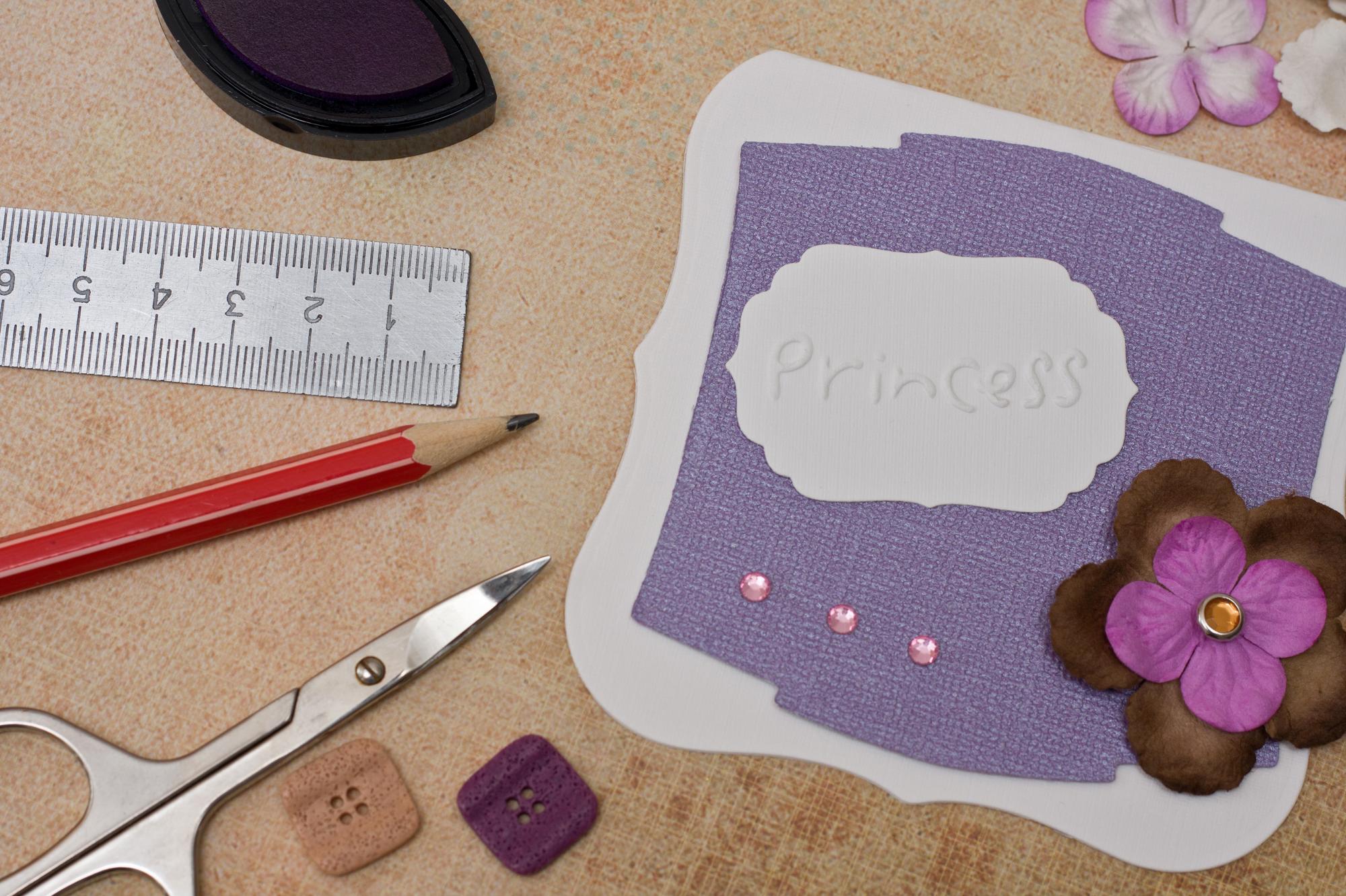 series of embroidered patches laid out