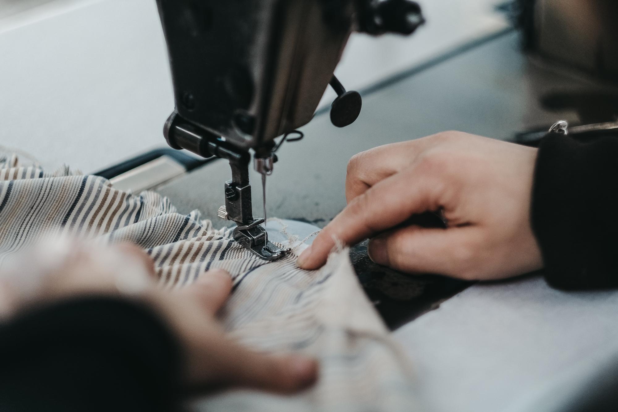 studio embroidery machine and sample stitches on fabric